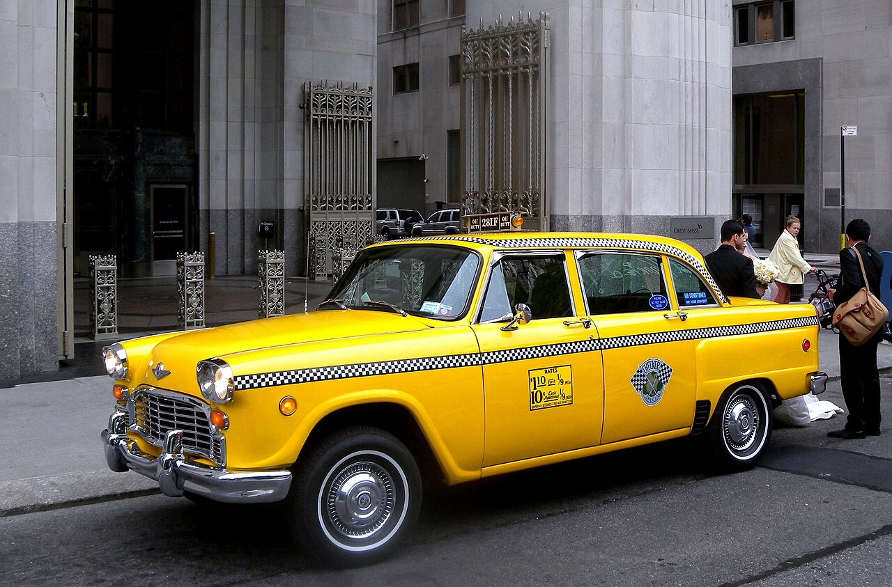 A classic taxi cab in an urban setting