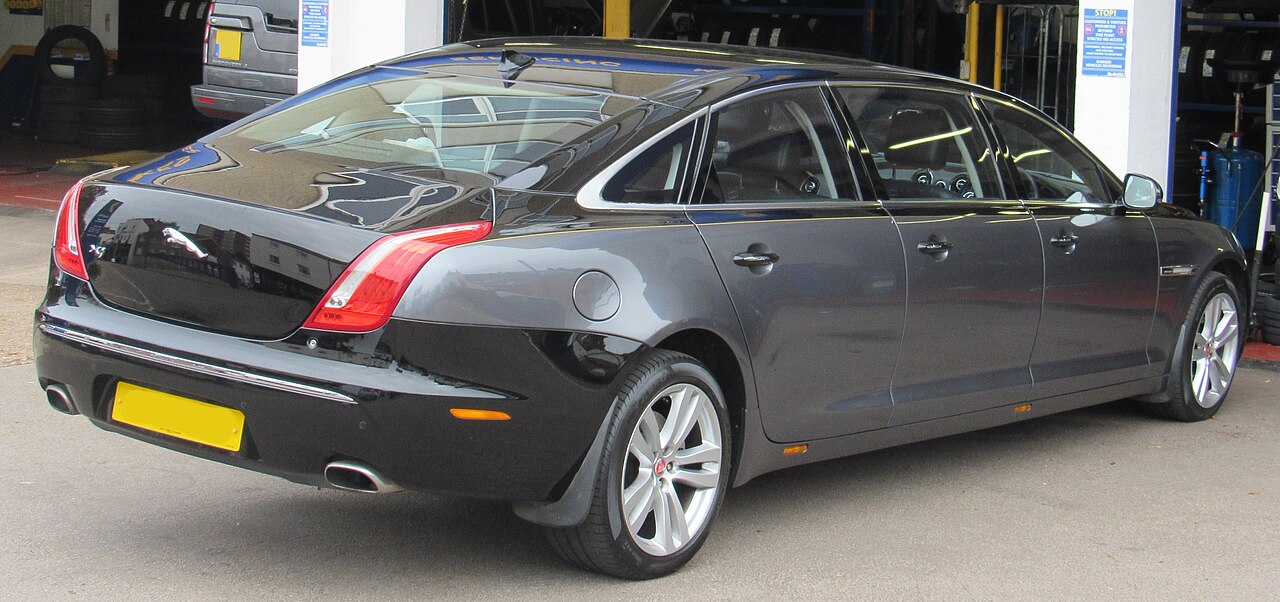A modern limousine parked and ready for service